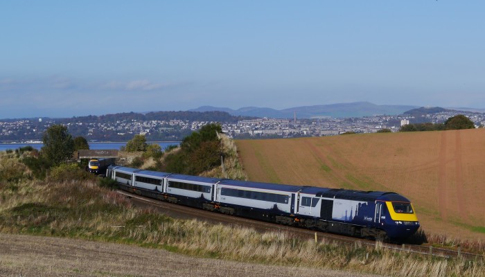 A ScotRail high-speed Inter7City train travelling south after crossing the Tay Bridge