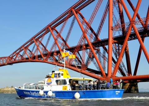 Forth Tours cruise beside Forth Bridge