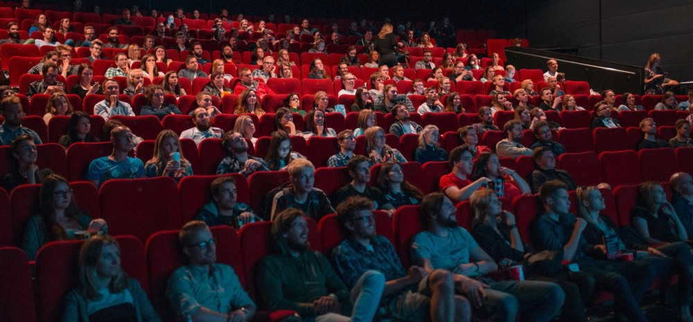 People sitting in a film cinema