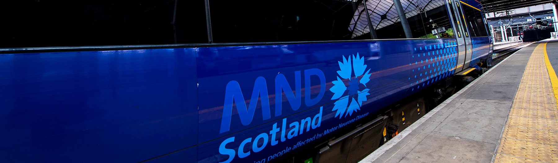 ScotRail train with MND Scotland logo