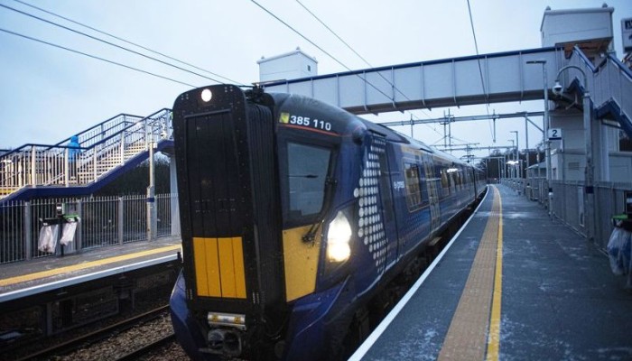 Class 385 train sitting in the brand new Robroyston station in Glasgow