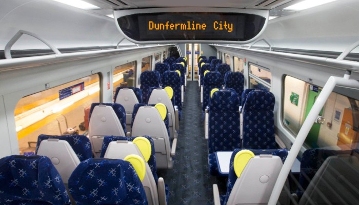 An on-train information screen showing Dunfermline City as the destination.