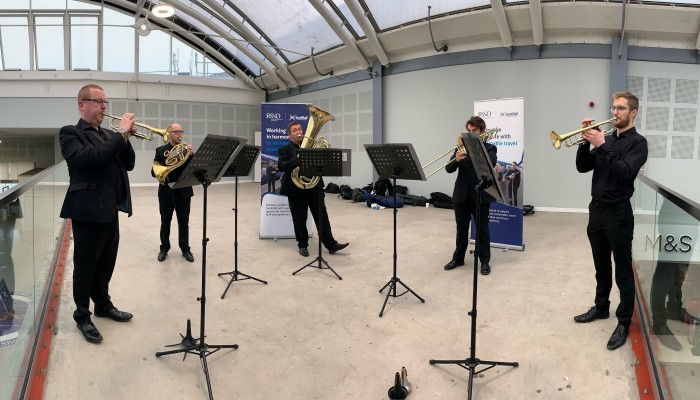 A quintet of Royal Scottish National Orchestra (RSNO) principal brass players entertain commuters and delegates at Haymarket station 