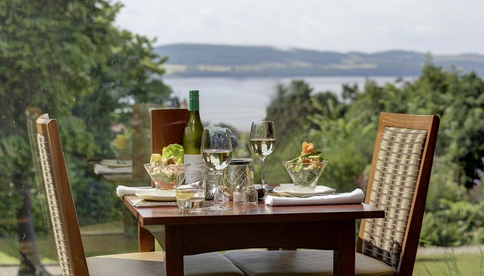 Dining table in window with scenic view
