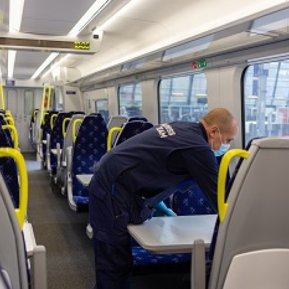 ScotRail staff cleaning a train
