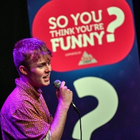 So you think your funny event image of comedian performing onstage 