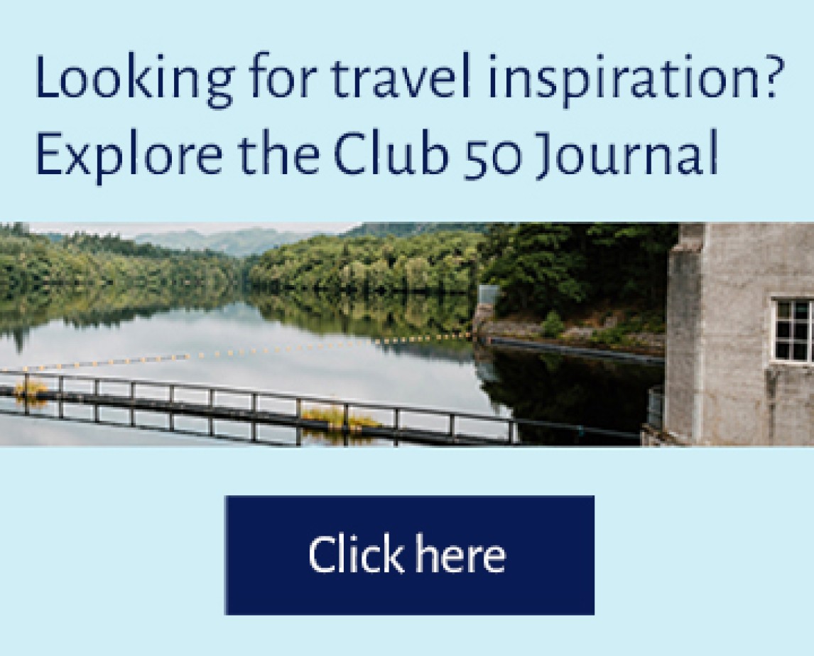 Image of a loch with text "Looking for travel inspiration? Explore the Club 50 Journal"