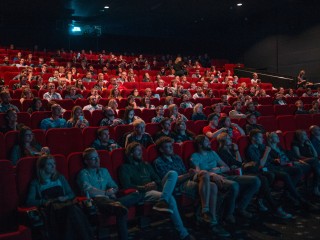 People sitting in a film cinema